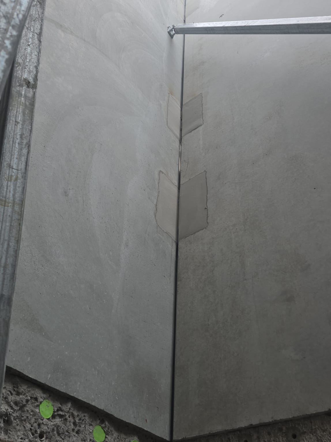 Patched concrete corner and joints